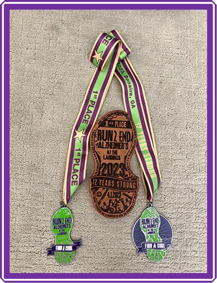 Left: 5K medal, Right: 10K medal; Shoe is for 1st Overall, Masters & Grandmasters M/F